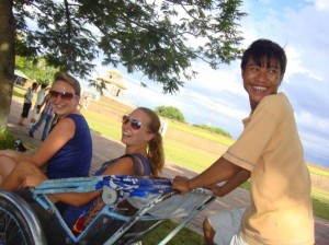 Local travellers in a cyclo in Vietnam